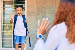 boy-waves-goodbye-to-mom